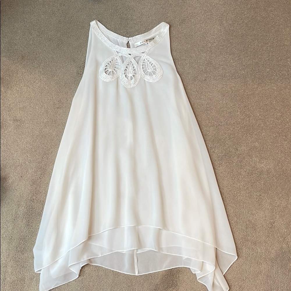 White sleeveless blouse